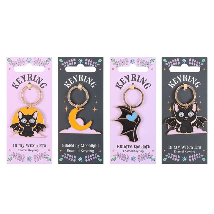 Set of 24 Cute and Creepy Keyrings on Display
