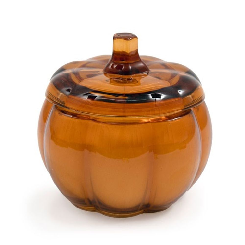 An amber-coloured glass jar, designed like a pumpkin with ribbed sections, serves as the perfect decor piece. Its lid features a short, smooth stem on top. The transparent glass gives it a warm, autumn-themed appearance—ideal for housing a vanilla-scented candle.