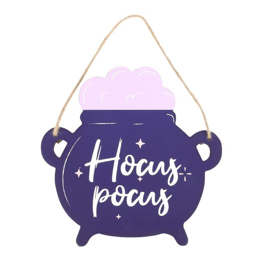 A purple cauldron hanging sign with light pink bubbles rising from the top, featuring the words Hocus Pocus in white script, is suspended by a length of twine—perfect for whimsical Hallowe’en décor.