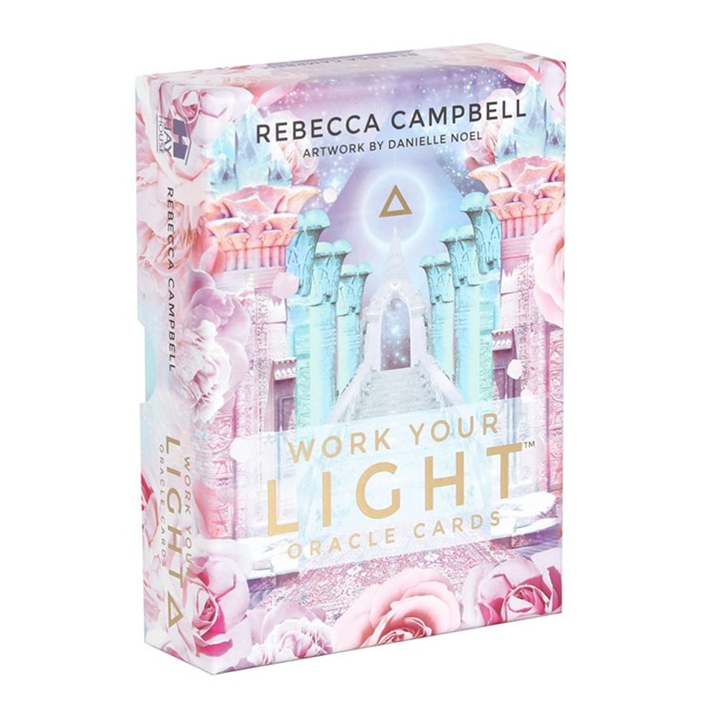 The image depicts the Work Your Light Oracle Cards box, featuring a mystical temple scene with blue columns, pink roses, and a starry sky. Created by Rebecca Campbell and Danielle Noel, this oracle card deck offers light and guidance to its users.