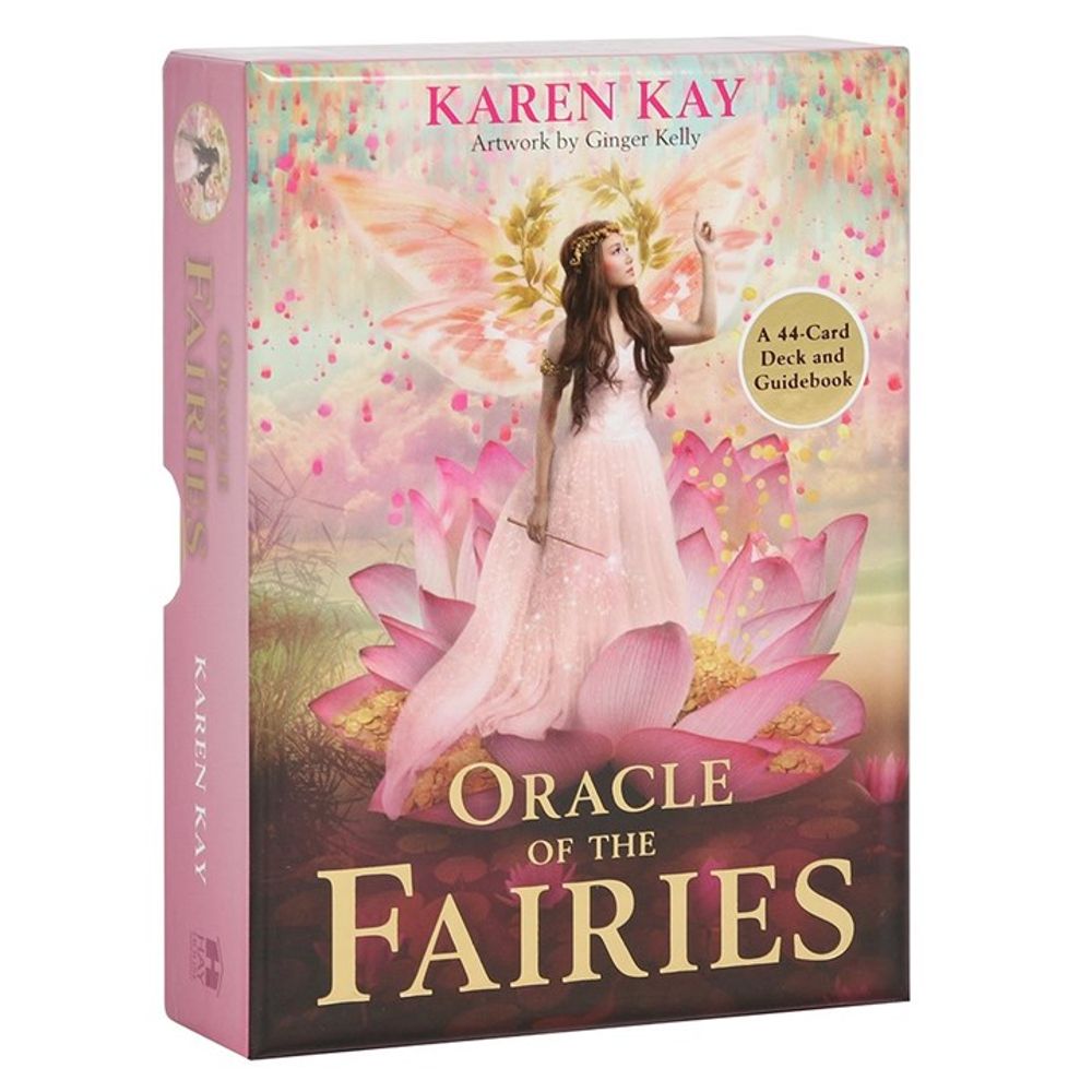The image depicts a box for Oracle of the Fairies by Karen Kay, illustrated by Ginger Kelly. The cover transports you to a magical fairy world, featuring a fairy in a pink dress on a large flower. This deck of 44 cards and guidebook offers insights into everyday life against a dreamlike backdrop.