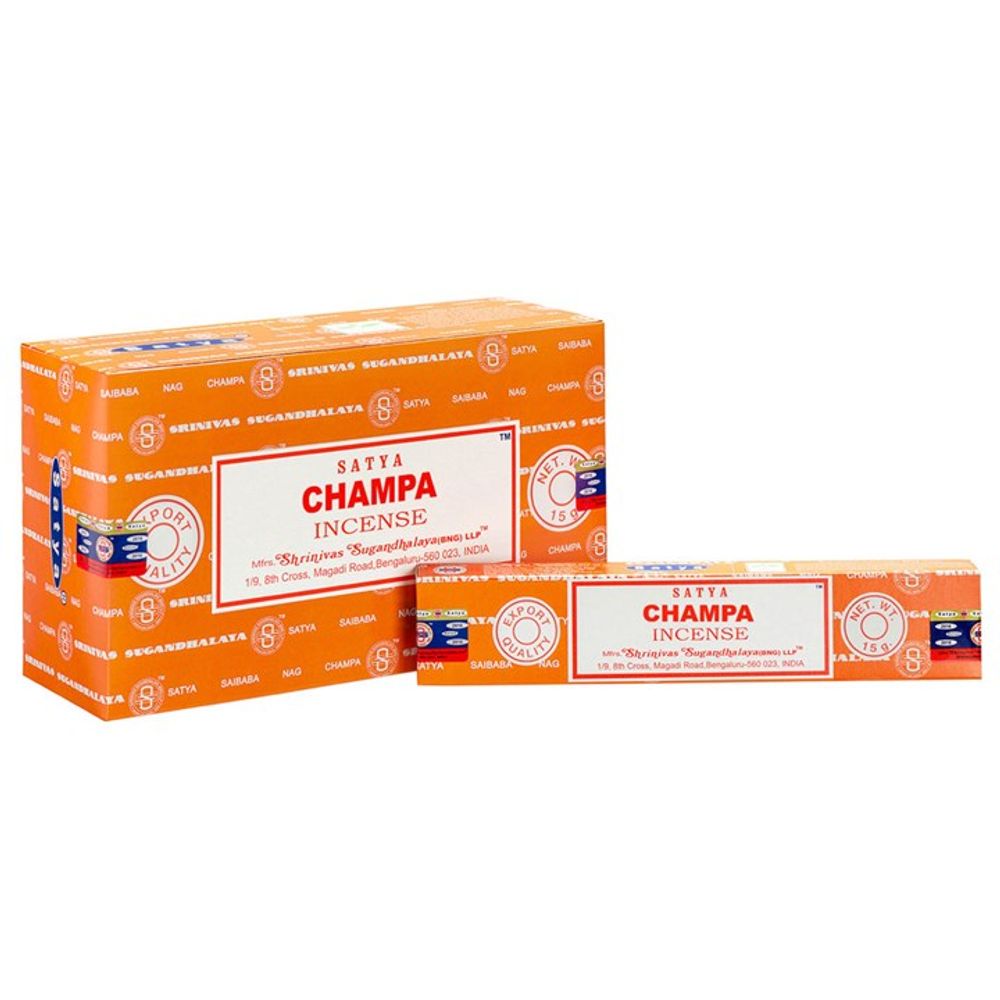 The orange and red packaging of Satya Champa Incense exudes mental clarity. The large box displays brand details, while the smaller box sits at the front. Both boxes feature white labels with text and logos, incorporating traditional Indian design motifs and a circular emblem. Suitable for vegans, with the origin stated as India.