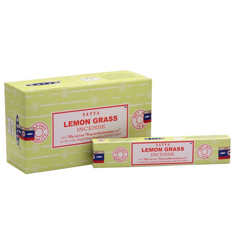 Two boxes of Satya Lemongrass incense are displayed: one large and rectangular, and the other smaller and slimmer, placed in front. Both are yellow-green with red text and feature branding details. The larger box has a blue logo on the side; both handcrafted boxes have a quality seal.