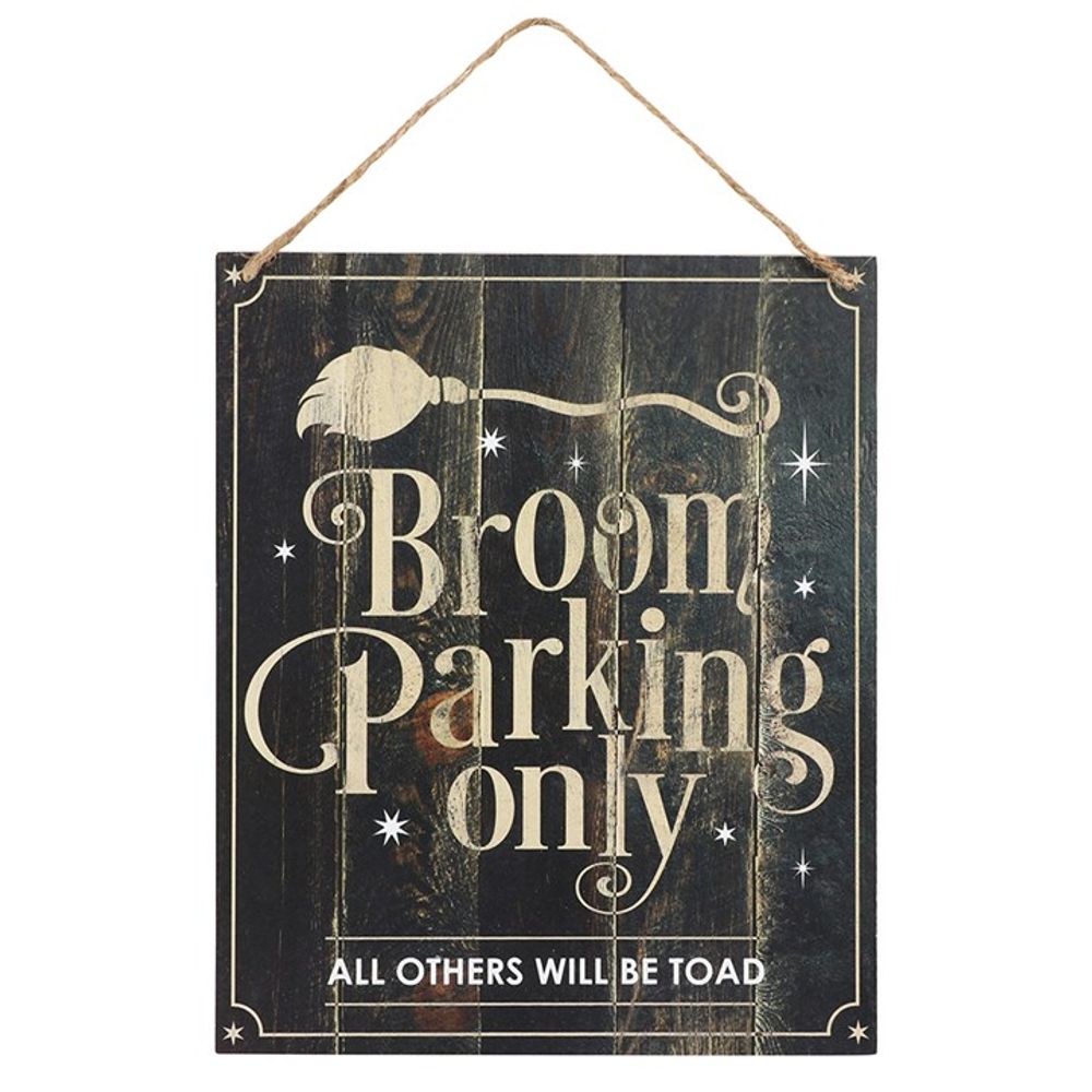 A decorative accessory, this hanging wooden sign features a broom illustration and reads Broom Parking Only in bold. Perfect for Halloween, its rustic dark background warns, All others will be toad.