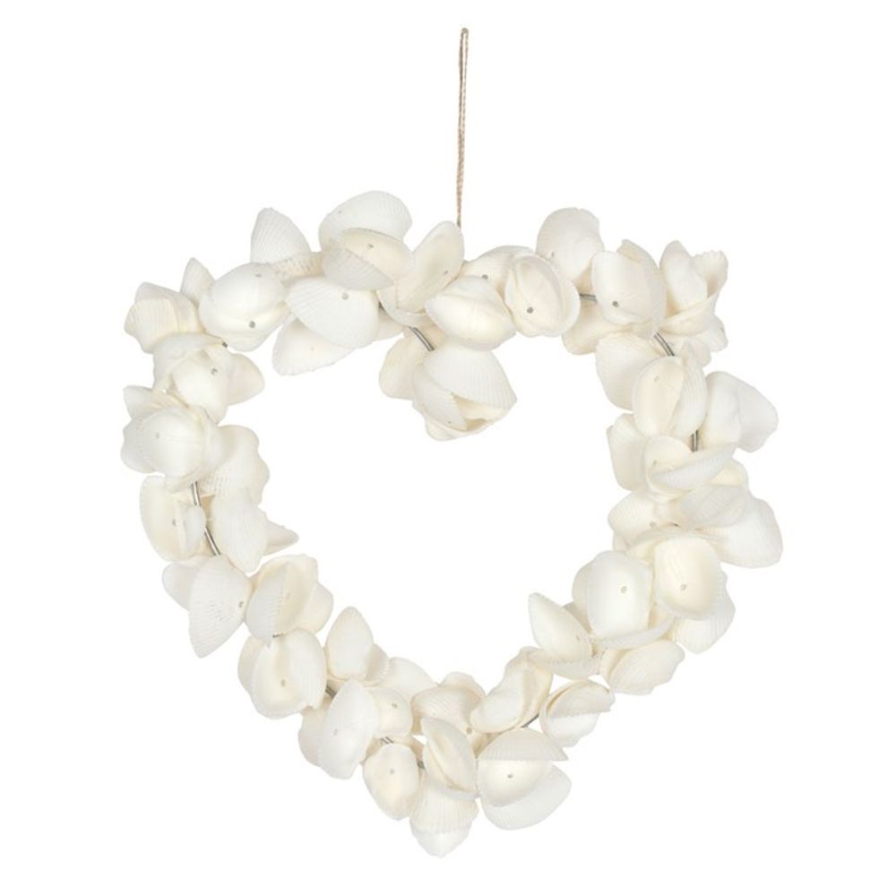 A heart-shaped wreath crafted from white clamshells strung together. The shells are arranged closely, creating a textured, three-dimensional appearance. A thin string is attached at the top for hanging, making it ideal as elegant seaside décor for any coastal-themed space.