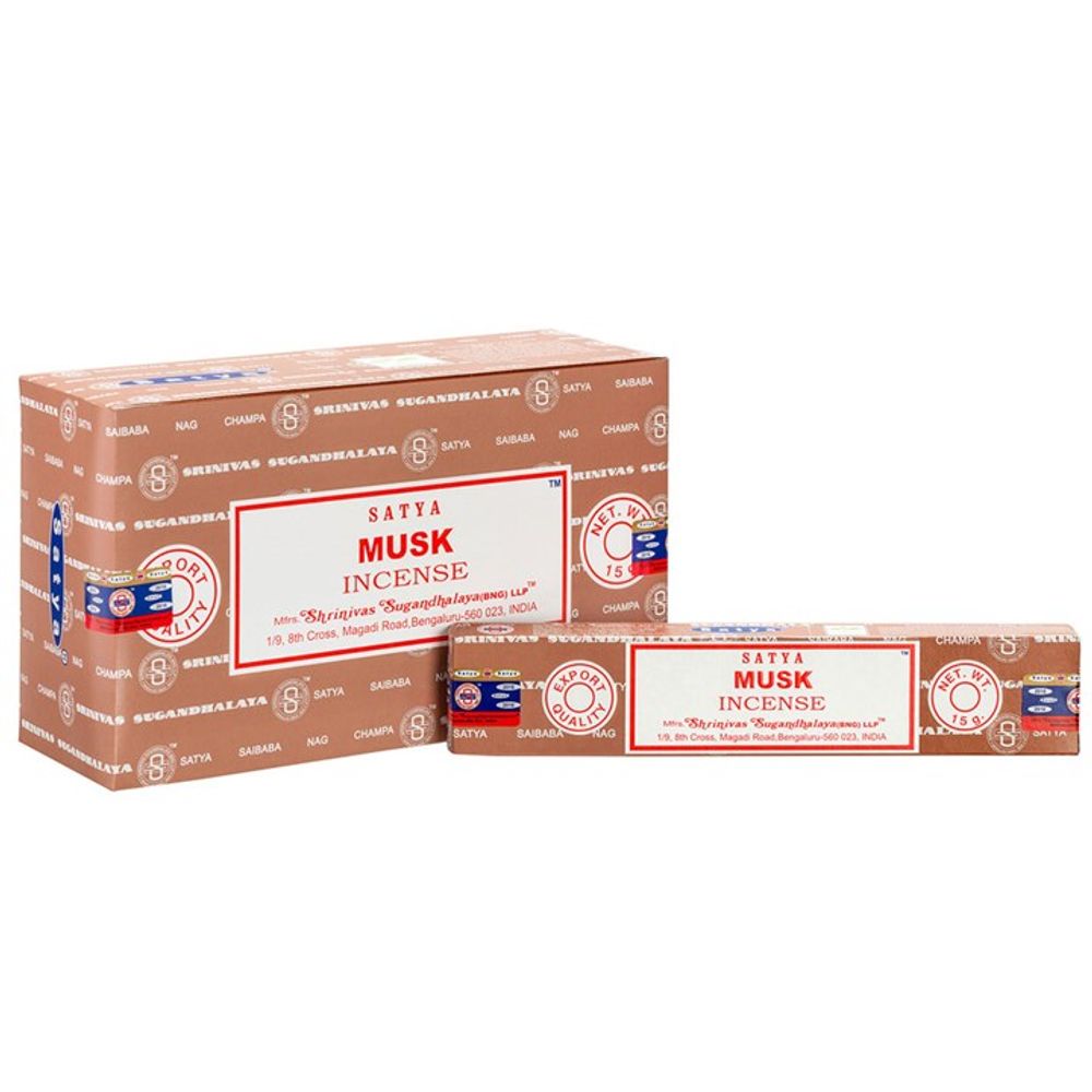 Two boxes of Satya Musk Incense are displayed: the larger stands upright, and the smaller rests in front. Both brown boxes with white text and decorative red and white labels feature logos and product details, evoking a traditional Indian design crafted using artisanal methods.