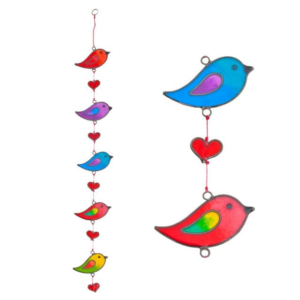 A vertical hanging mobile features an ethically sourced, colourful string of stained glass birds and red heart accents. In shades of red, blue, purple, yellow, and green, this vibrant sun-catcher adds a whimsical touch to any space.
