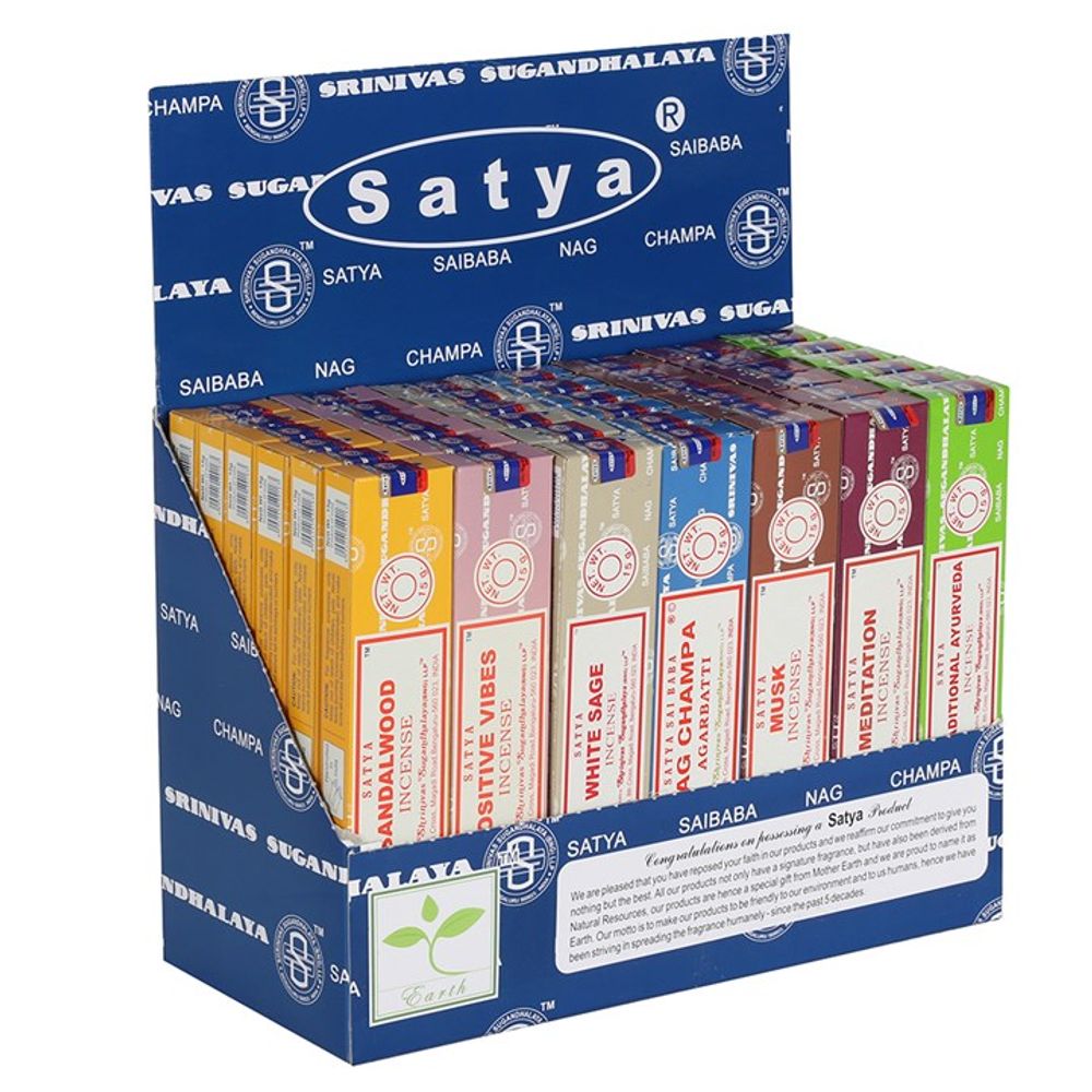 A display box of Satya incense sticks, ideal for meditation, features a variety of scents such as Sandalwood, White Sage, and Nag Champa. The blue box with white text presents colourful packs neatly fanned out, with a green logo on the front.