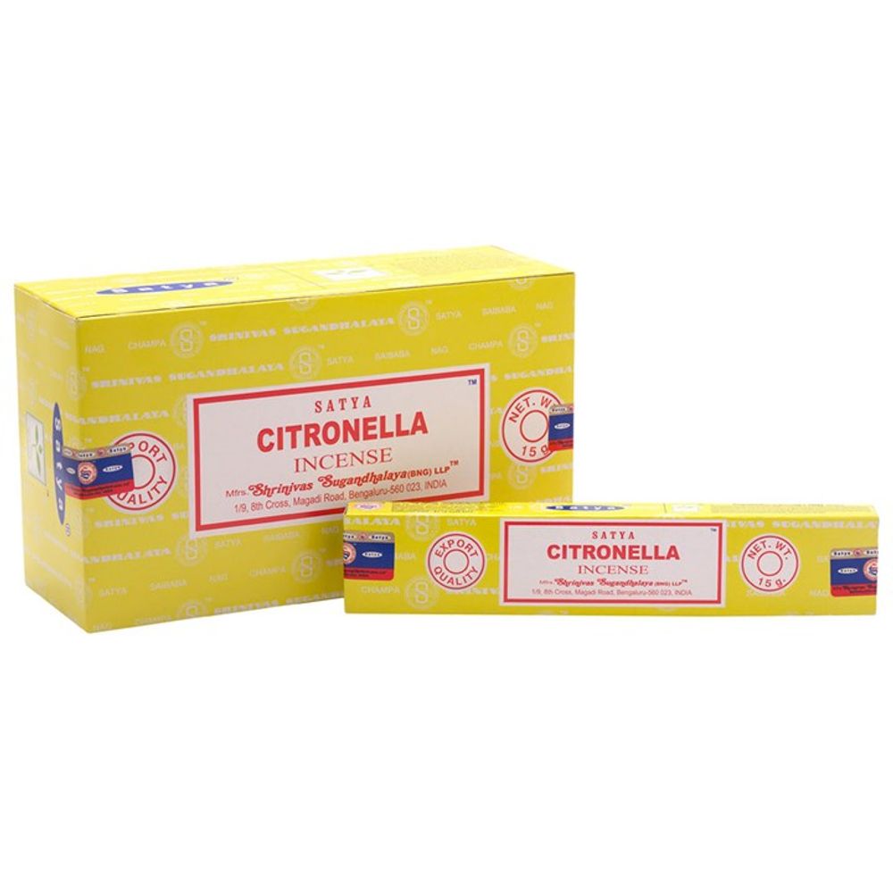 Yellow packaging of Satya Citronella Incense, handcrafted in India, displays branding details. The larger box is positioned behind a smaller rectangular one, both featuring red and white text. Quality is displayed alongside a circular logo, while the design is embellished with a pattern of small graphics.