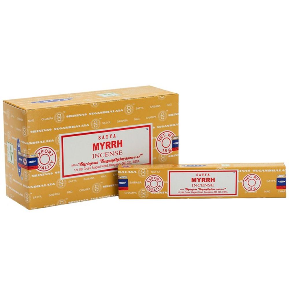 Two boxes of Satya Myrrh Incense are on display, showcasing the distinct myrrh fragrance. The larger box stands upright with a yellow-orange background and red accents, while the smaller one lies in front with a matching design. Both vegan-friendly boxes feature blue and purple stripes on the sides.