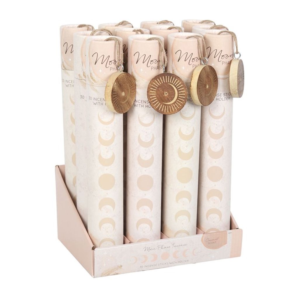 A display box of Moon Phase Incense tubes, each containing 30 coconut-fragranced incense sticks and a wooden holder. The packaging showcases moon phase designs in soft beige tones, with each tube adorned with a small, decorative round holder.