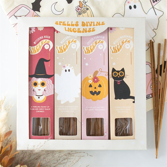 Discover the Spells Divine Gift Set: a boxed collection of Halloween incense, featuring enchanting scents and adorable illustrated characters—a witch, ghost, pumpkin, and black cat with festive autumnal details.