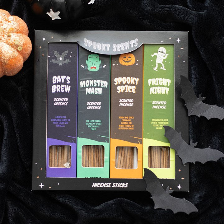 A spooky-scented gift, the Spooky Scents box features four Halloween incense sticks—Bat’s Brew, Monster Mash, Spooky Spice, and Fright Night—nestled in black fabric, with faux bats and a glittery pumpkin.