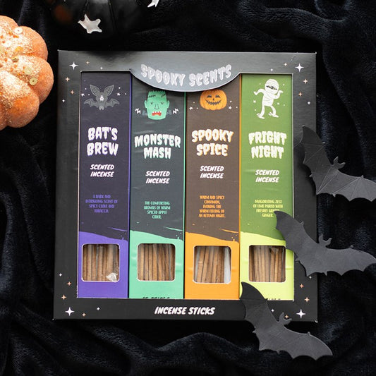 A spooky-scented gift, the Spooky Scents box features four Halloween incense sticks—Bat’s Brew, Monster Mash, Spooky Spice, and Fright Night—nestled in black fabric, with faux bats and a glittery pumpkin.