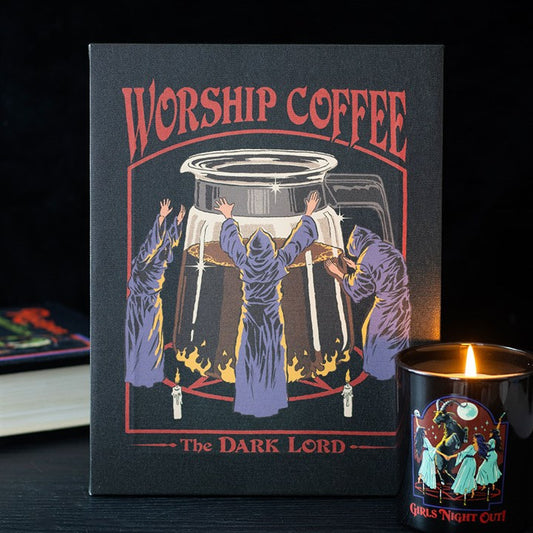A Steven Rhodes-inspired canvas print depicts three robed figures with raised arms worshipping a giant coffee pot set atop flames. Perfect for fans of quirky, retro gifts, it features “WORSHIP COFFEE” above and “The DARK LORD” below.