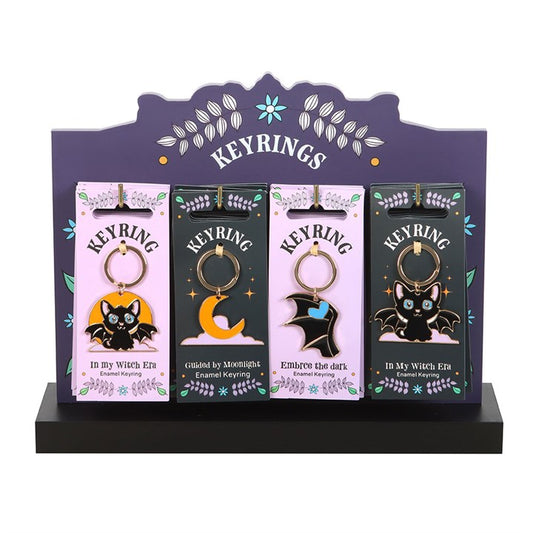 Set of 24 Cute and Creepy Keyrings on Display