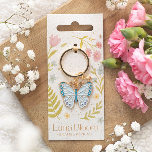 A charming butterfly keyring, ideal for nature enthusiasts, showcasing a delicate butterfly design on a robust enamel keyring.