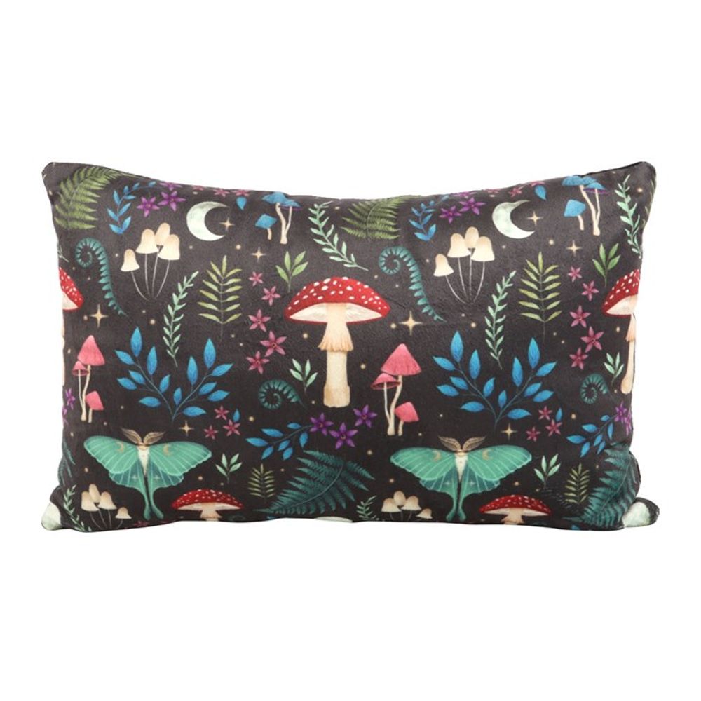 This printed cushion features a forest motif with whimsical illustrations of red and pink mushrooms, crescent moons, stars, turquoise moths, blue fern leaves, and small white flowers against a dark background. Perfect for adding charm to your home décor.